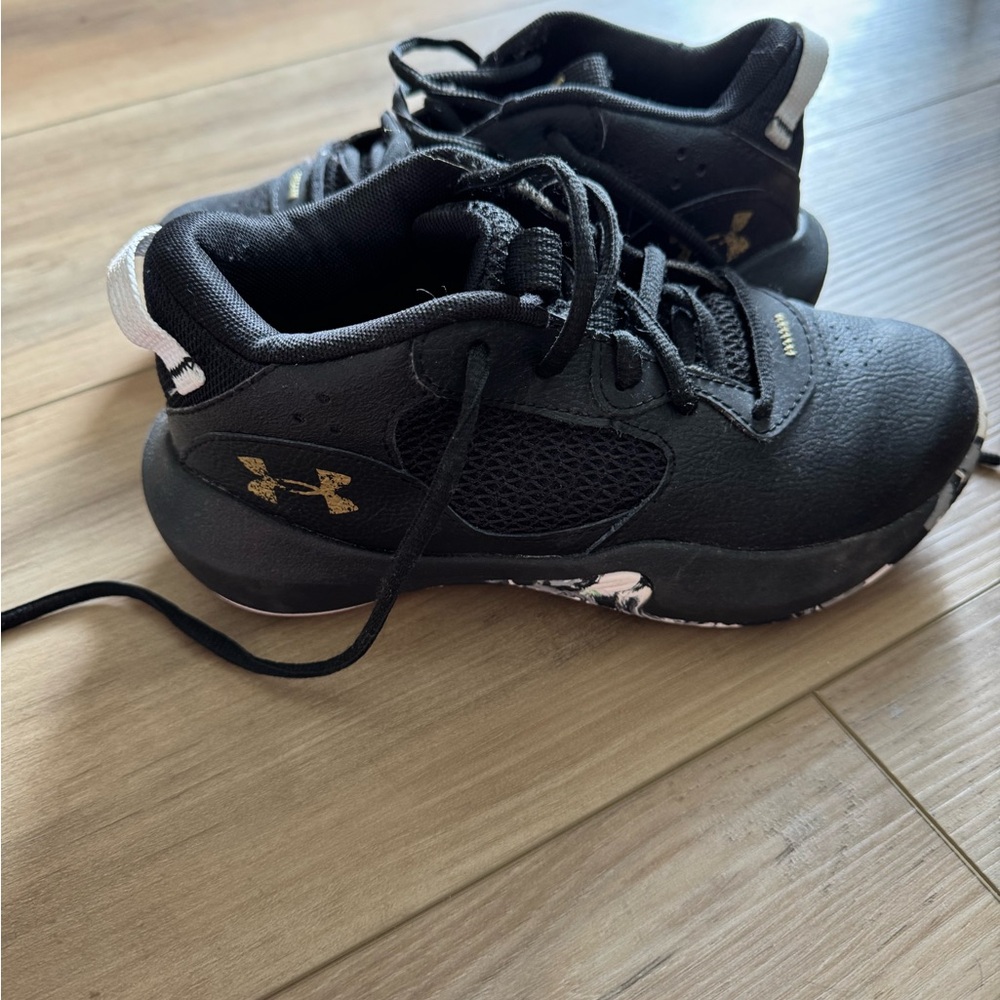Under Armour Black and Gold Sneakers for Active Lifestyle
